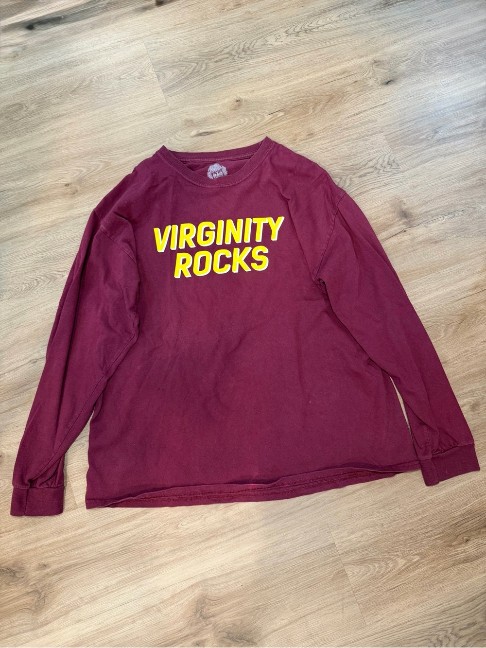 Maroon Long Sleeve Graphic Tee with Yellow 'VIRGINITY ROCKS' Print